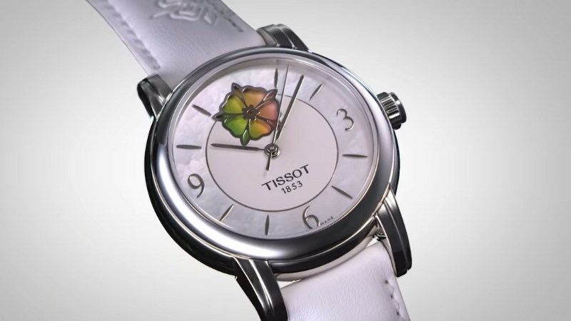 Tissot Lady Heart được thiết kế với kiểu dáng lộ cơ tạo hình đóa hoa điệu Tissot Lady Heart được thiết kế với kiểu dáng lộ cơ tạo hình đóa hoa điệu