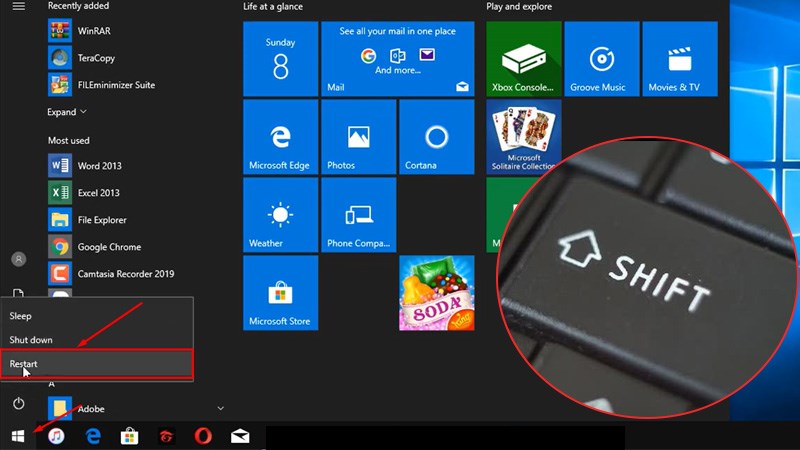 Khởi động Start Menu > Chọn nút Power > Bấm và giữ phím Shift trong vài giây > Chọn Restart 