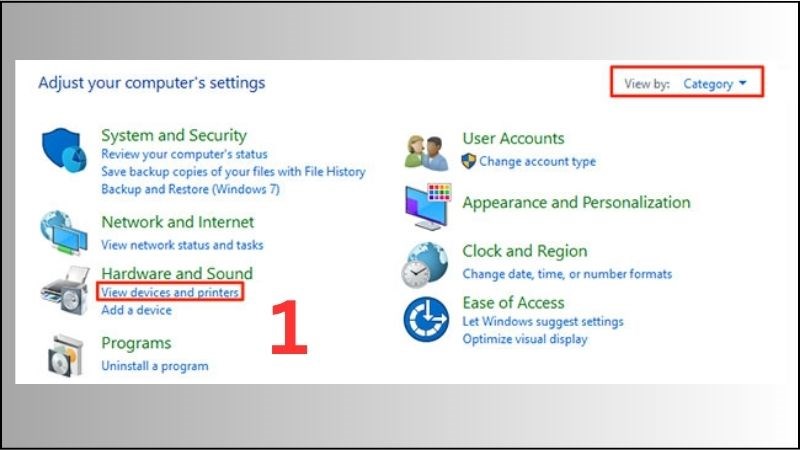 Vào mục Devices and Printers