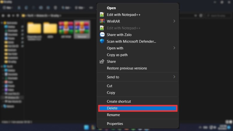 z Xóa file nén bằng cách chọn Delete (Xóa)