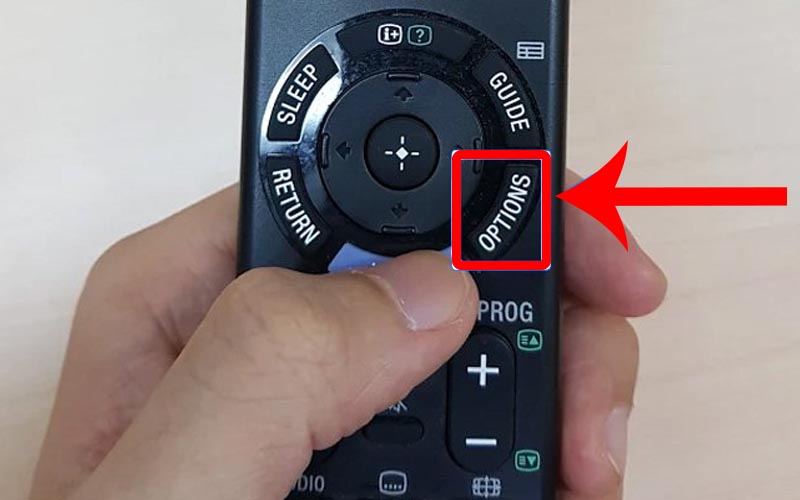 Nhấn nút Options trên remote