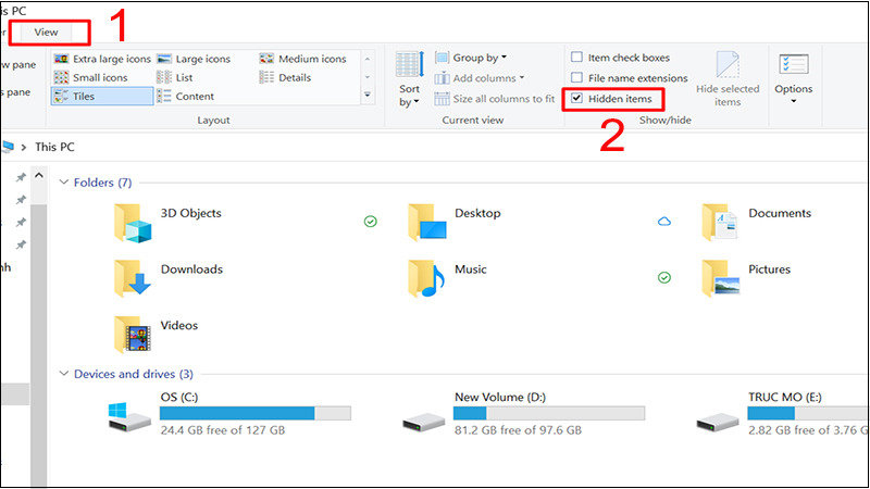 Chọn tab View và tick vào mục Hidden items
