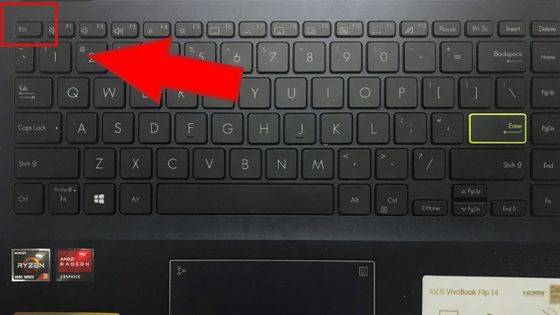Chọn phím Esc
