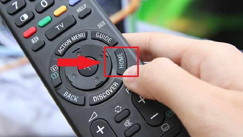 Nhấn nút HOME trên remote tivi